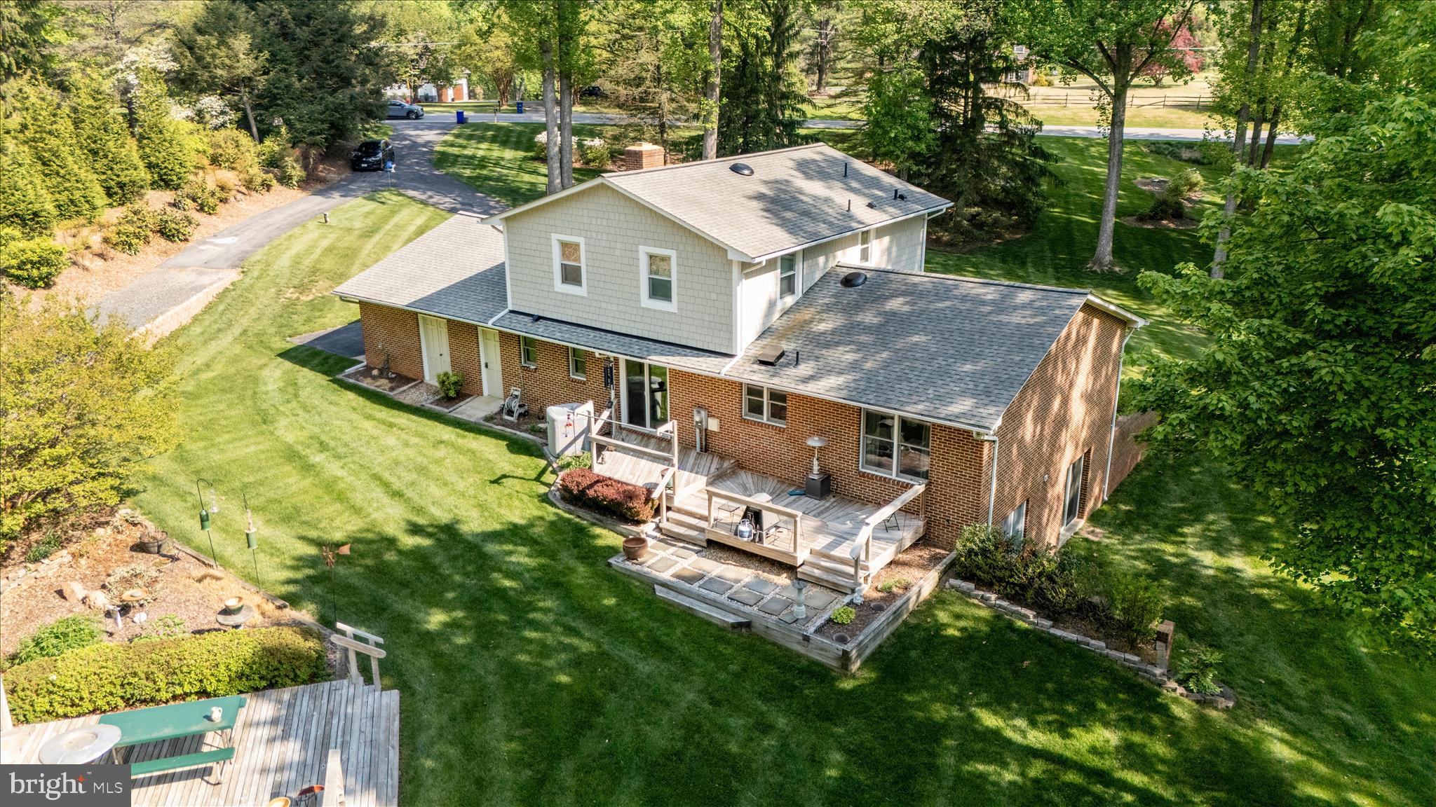 13949 Brighton Dam Road Clarksville, MD 21029 - Photo 13 of 27 an aerial view of a house with a garden