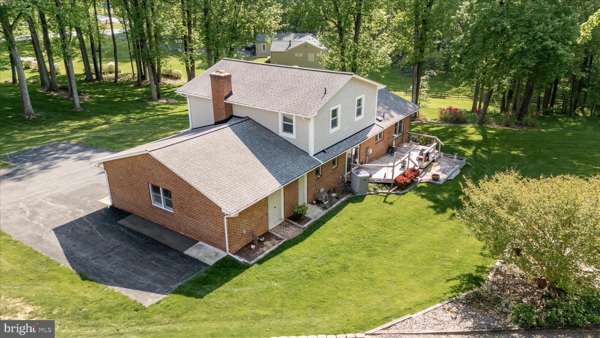 13949 Brighton Dam Road Clarksville, MD 21029 - Photo 15 of 27 an aerial view of a house having yard