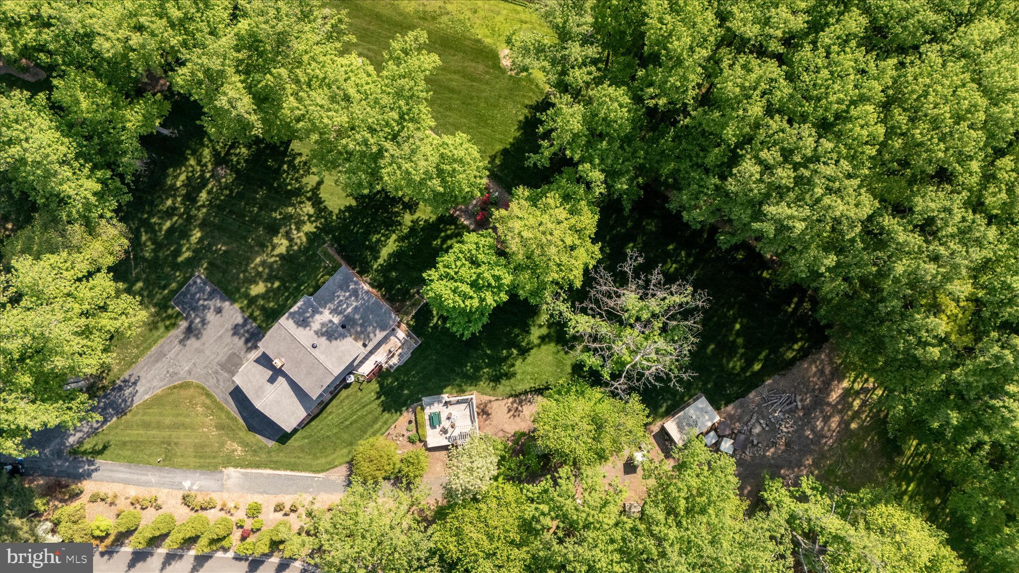 13949 Brighton Dam Road Clarksville, MD 21029 - Photo 16 of 27 an aerial view of a house with a yard basket ball court and outdoor seating