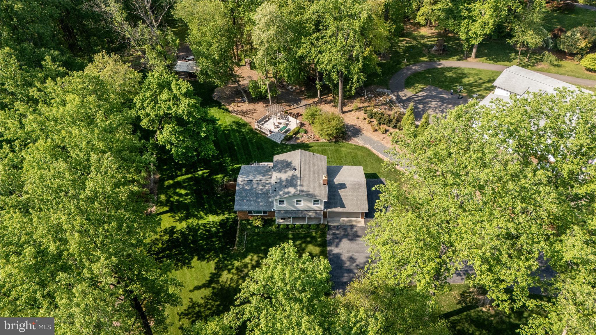 13949 Brighton Dam Road Clarksville, MD 21029 - Photo 5 of 27 an aerial view of a house with a yard