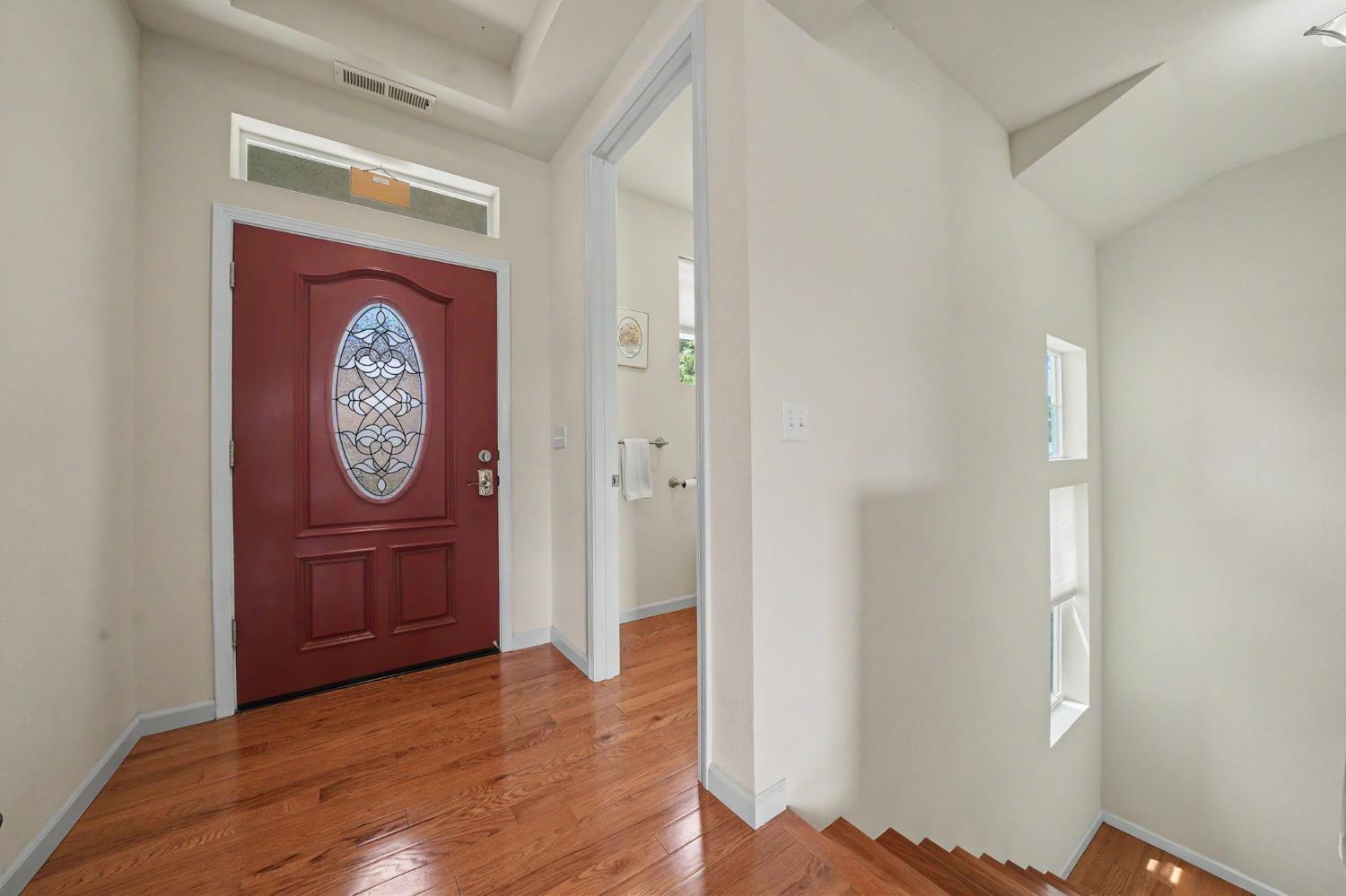 6066 Bluff View Road Copperopolis, CA 95228 - Photo 16 of 96 a view of front door with wooden floor
