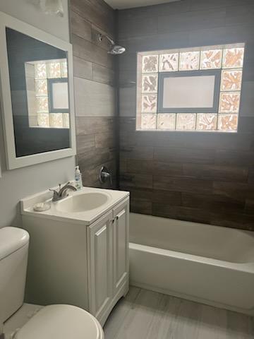 8741 South Cottage Grove Avenue, Unit 1E Chicago, IL 60619 - Photo 6 of 6 a bathroom with a sink and a bathtub
