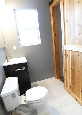 a bathroom with a sink and a toilet