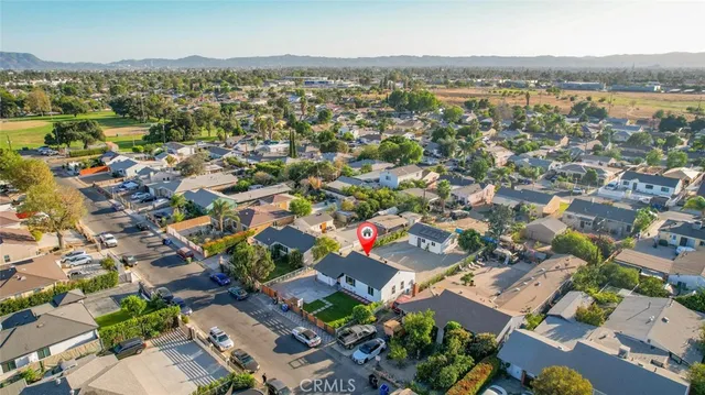 an aerial view of a city with lots of residential buildings