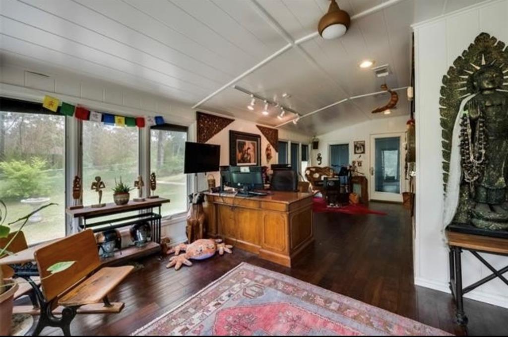 6049 West Red Bird Lane Dallas, TX 75236 - Photo 19 of 34 a kitchen with stainless steel appliances granite countertop sink stove and wooden cabinets