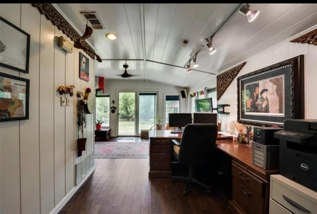 6049 West Red Bird Lane Dallas, TX 75236 - Photo 20 of 34 a living room with furniture and a flat screen tv