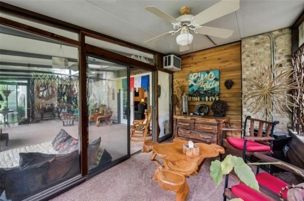 6049 West Red Bird Lane Dallas, TX 75236 - Photo 27 of 34 a living room with furniture and a potted plant