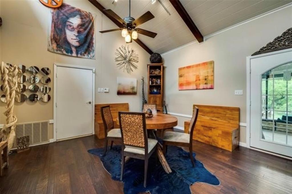 6049 West Red Bird Lane Dallas, TX 75236 - Photo 8 of 34 a dining room with furniture and wooden floor