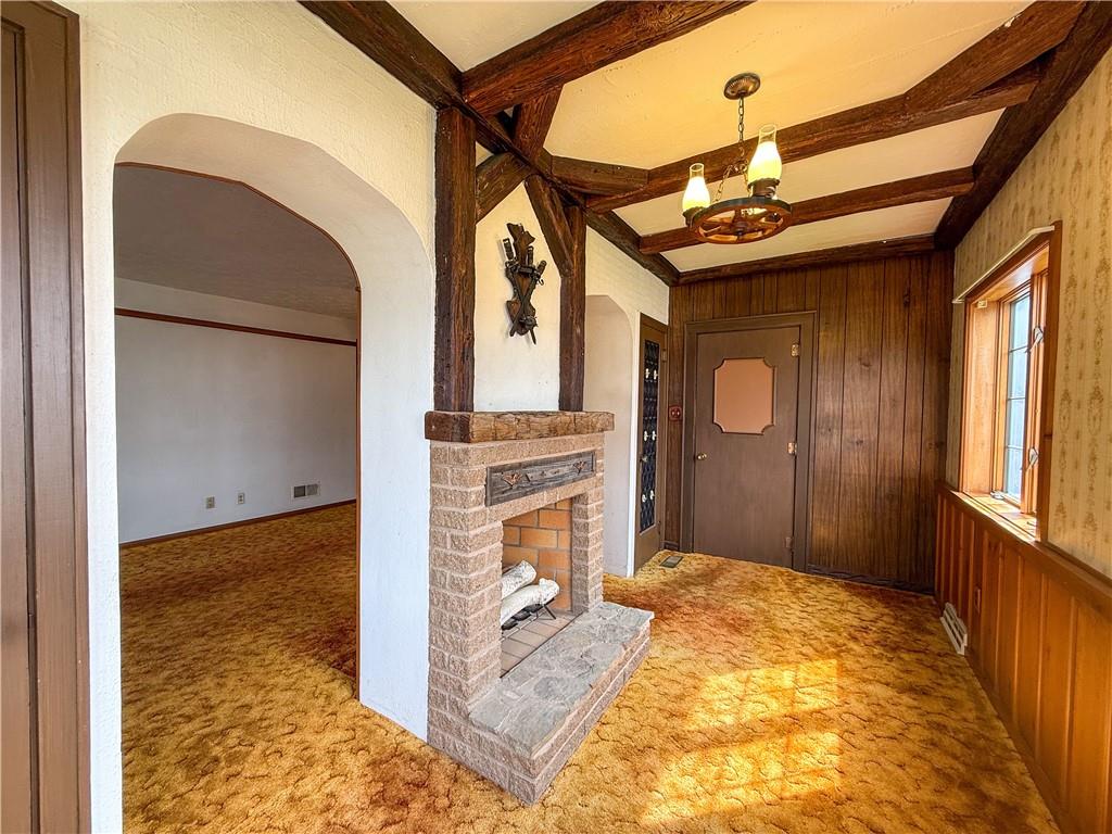 122 Lower Troy Hill Road Kittanning, PA 16201 - Photo 14 of 42 a view of a livingroom with wooden floor and a fireplace