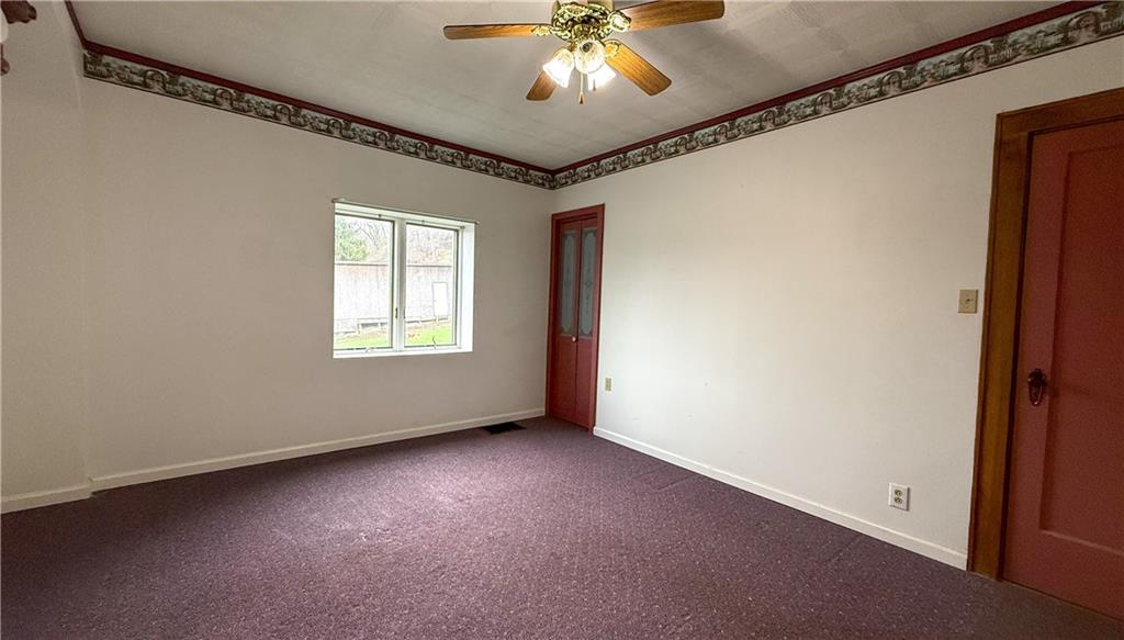 122 Lower Troy Hill Road Kittanning, PA 16201 - Photo 17 of 42 a view of an empty room with a window