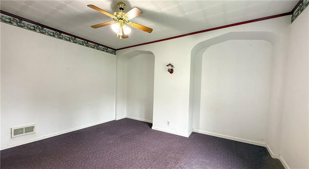 122 Lower Troy Hill Road Kittanning, PA 16201 - Photo 19 of 42 a view of a hallway with a chandelier fan and closet