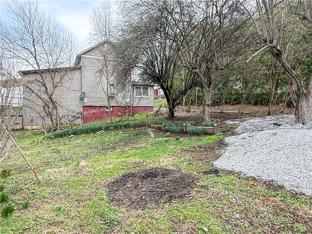 122 Lower Troy Hill Road Kittanning, PA 16201 - Photo 37 of 42 a front view of a house with a yard