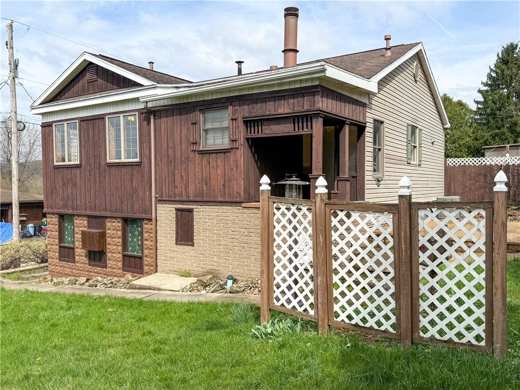 122 Lower Troy Hill Road Kittanning, PA 16201 - Photo 39 of 42 a front view of a house with garden