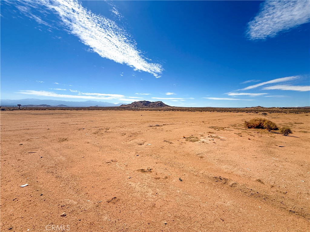 3 Adobe Mountain Road Adelanto, CA 92301 - Photo 13 of 14 a view of an ocean beach
