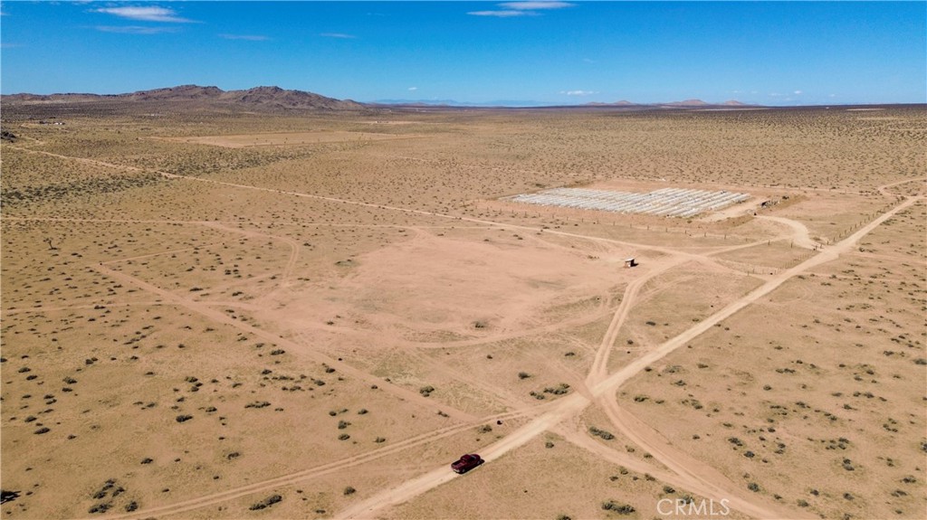 3 Adobe Mountain Road Adelanto, CA 92301 - Photo 2 of 14 a view of beach and an ocean