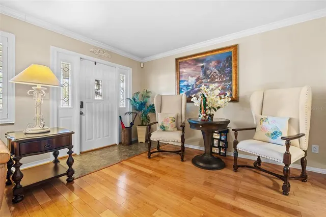 a living room with furniture and a table