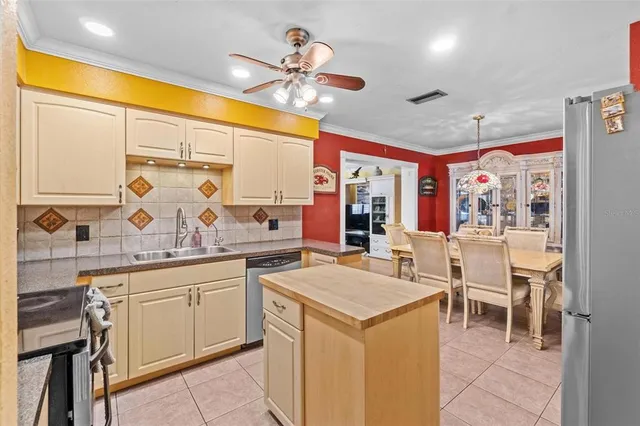 a kitchen with a sink counter top space and appliances