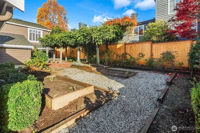 a view of a backyard of the house