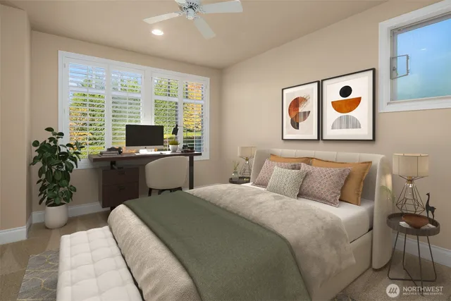 a bedroom with a bed and a potted plant