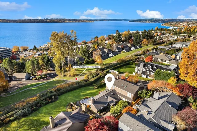 an aerial view of a house with a lake view