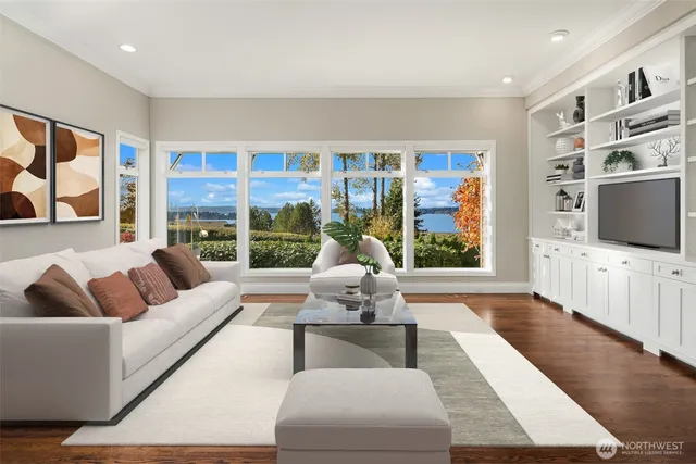 a living room with furniture fireplace and flat screen tv