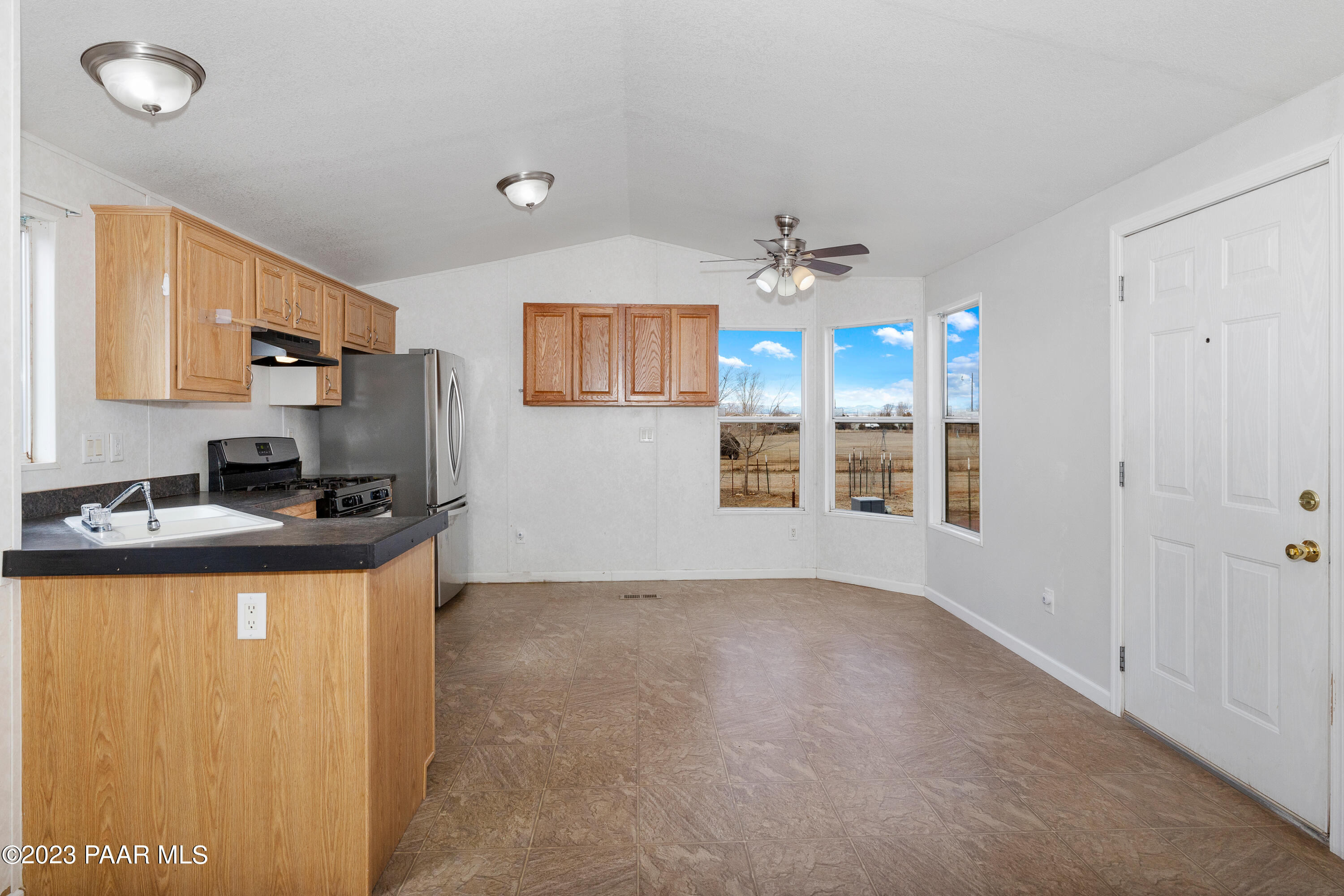 1255 West Brand Iron Road Paulden, AZ 86334 - Photo 9 of 24 009_Kitchen And Dining Area