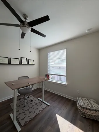 a room with furniture and a window