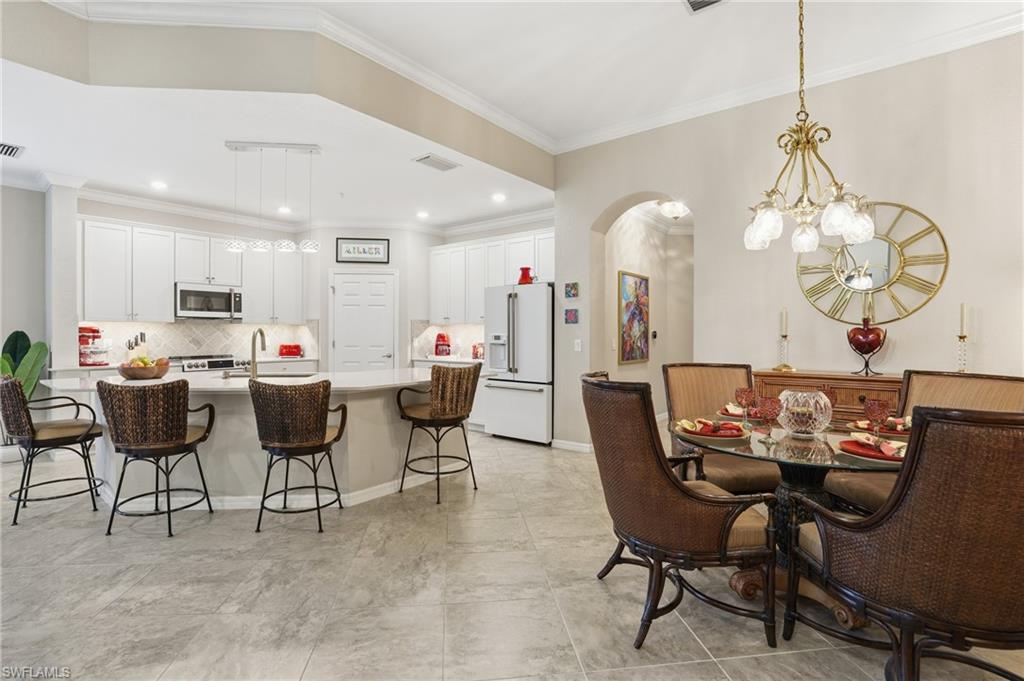 10505 Casella Way, Unit 202 Fort Myers, FL 33913 - Photo 15 of 50 a view of a dining room and a livingroom