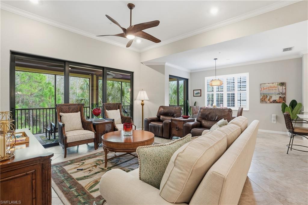 10505 Casella Way, Unit 202 Fort Myers, FL 33913 - Photo 17 of 50 a living room with furniture and a large window