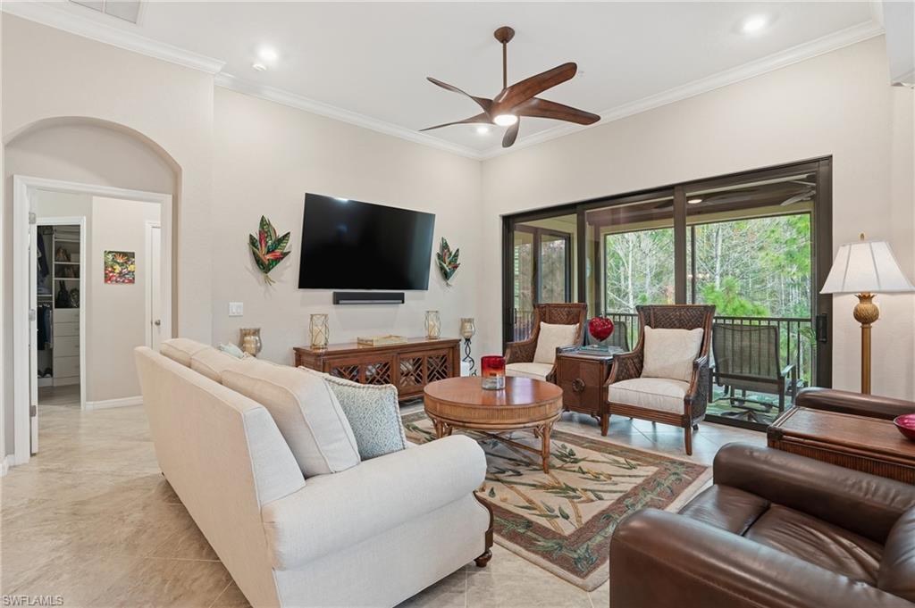 10505 Casella Way, Unit 202 Fort Myers, FL 33913 - Photo 20 of 50 a living room with furniture and a flat screen tv