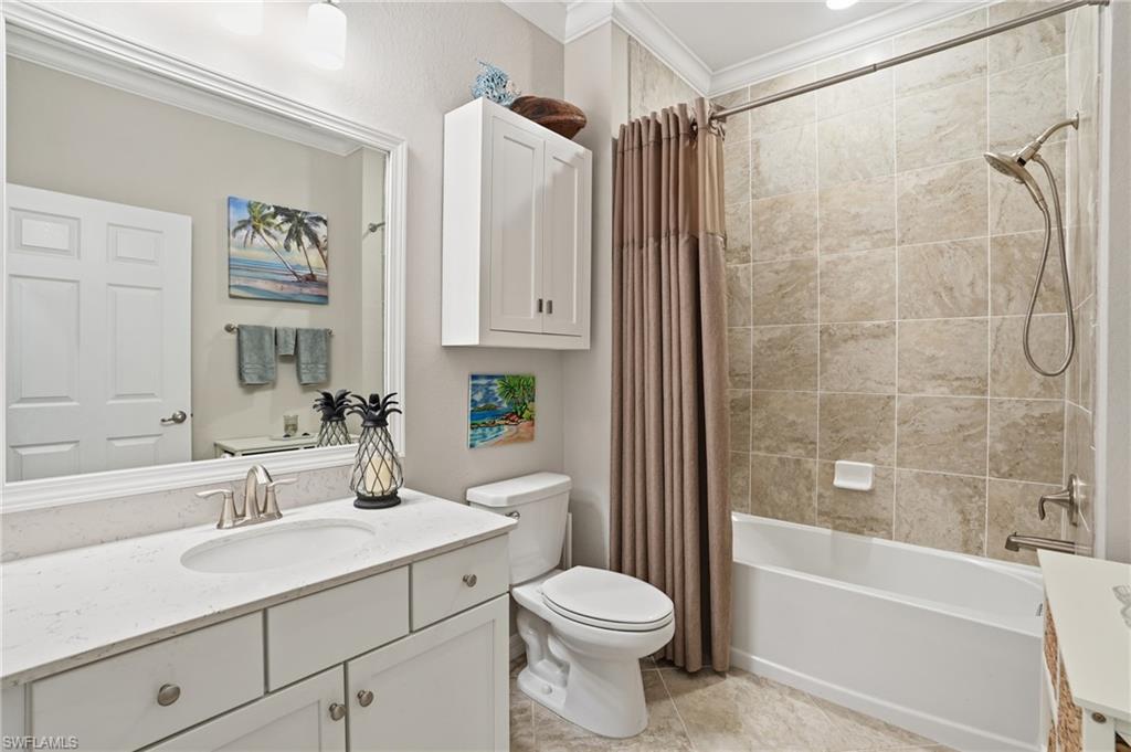 10505 Casella Way, Unit 202 Fort Myers, FL 33913 - Photo 37 of 50 a bathroom with a sink toilet and shower