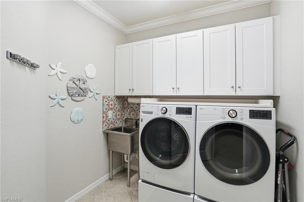 10505 Casella Way, Unit 202 Fort Myers, FL 33913 - Photo 40 of 50 a utility room with dryer and washer