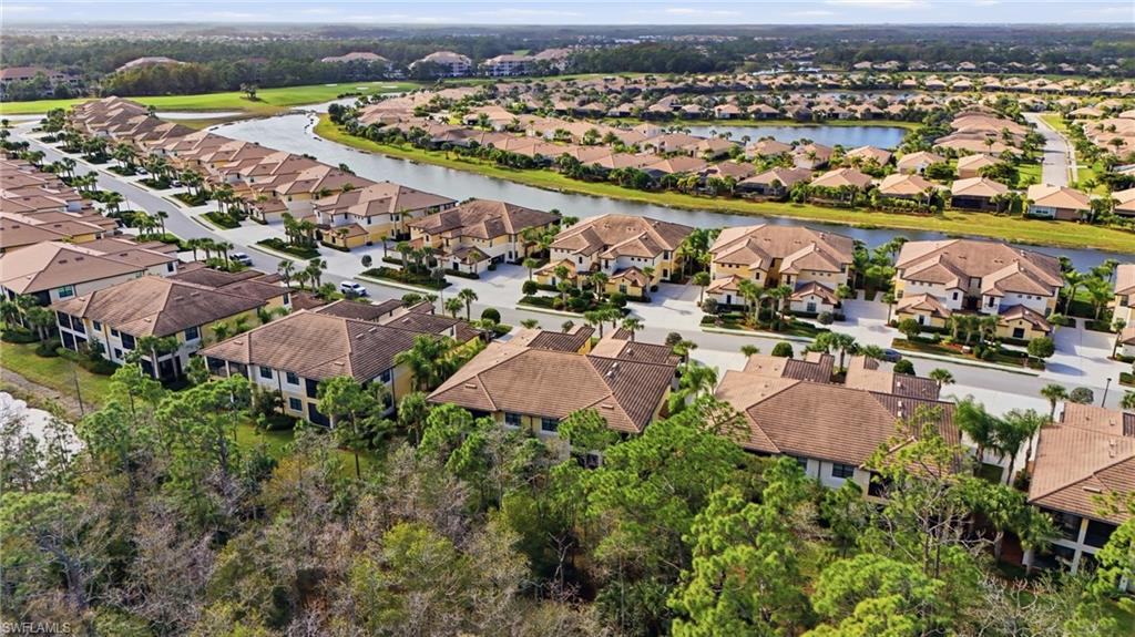 10505 Casella Way, Unit 202 Fort Myers, FL 33913 - Photo 47 of 50 an aerial view of residential houses with outdoor space