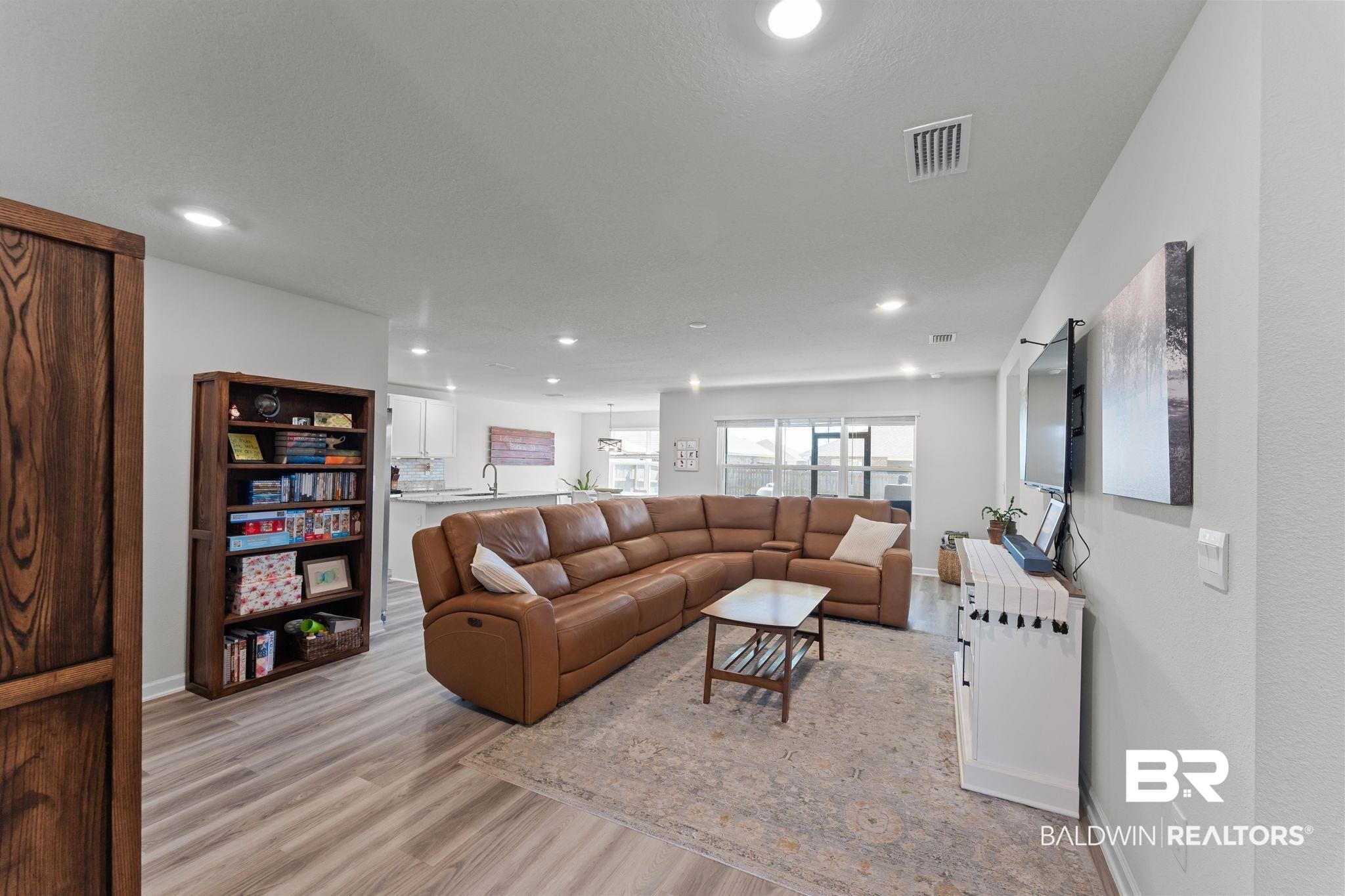 24337 Ringneck Loop Elberta, AL 36530 - Photo 5 of 34 Living area featuring light wood-style floors and recessed lighting