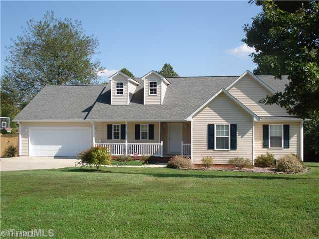 8074 Pritchett Road Browns Summit, NC 27214 - Photo 1 of 16 Exterior Front.