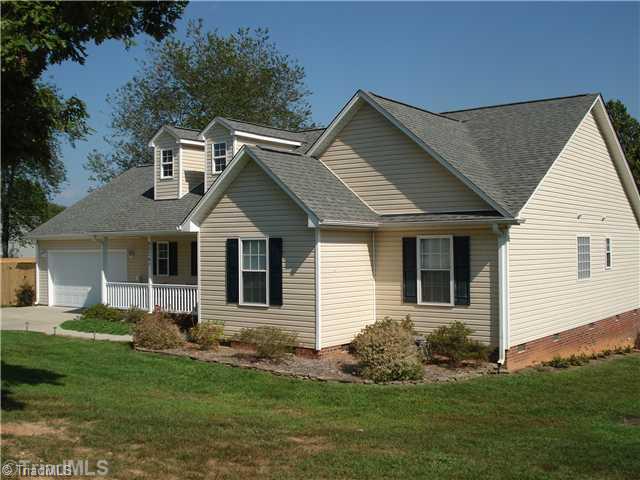 8074 Pritchett Road Browns Summit, NC 27214 - Photo 2 of 16 Exterior Front.