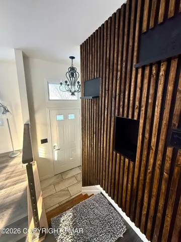 a view of a balcony with wooden floor