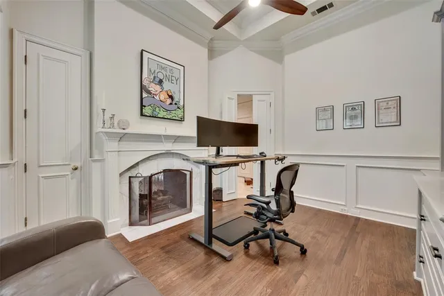 a bed room with a bed window and a chandelier