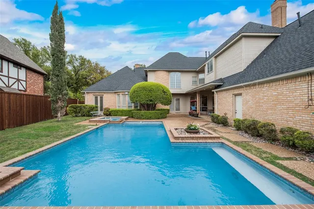 a view of a backyard with a garden