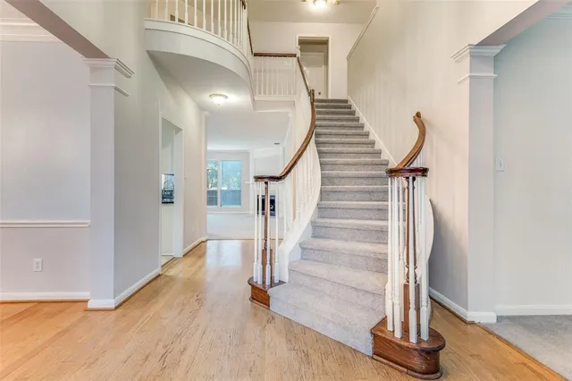 a view of entryway with wooden floor