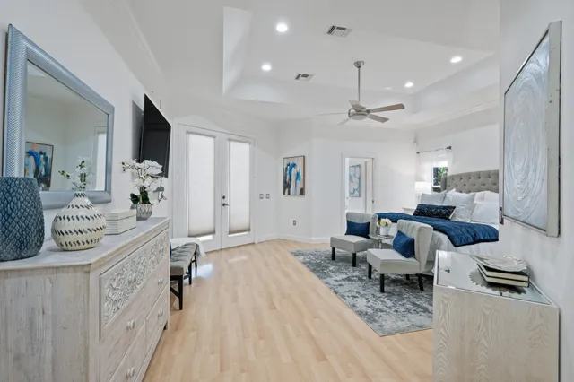 a view of a park with large trees