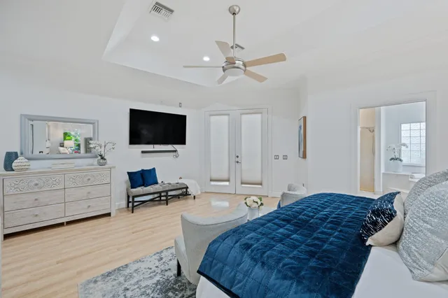 a view of a field with a tree