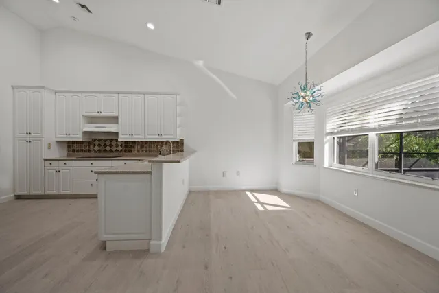 a view of a entryway and dining room
