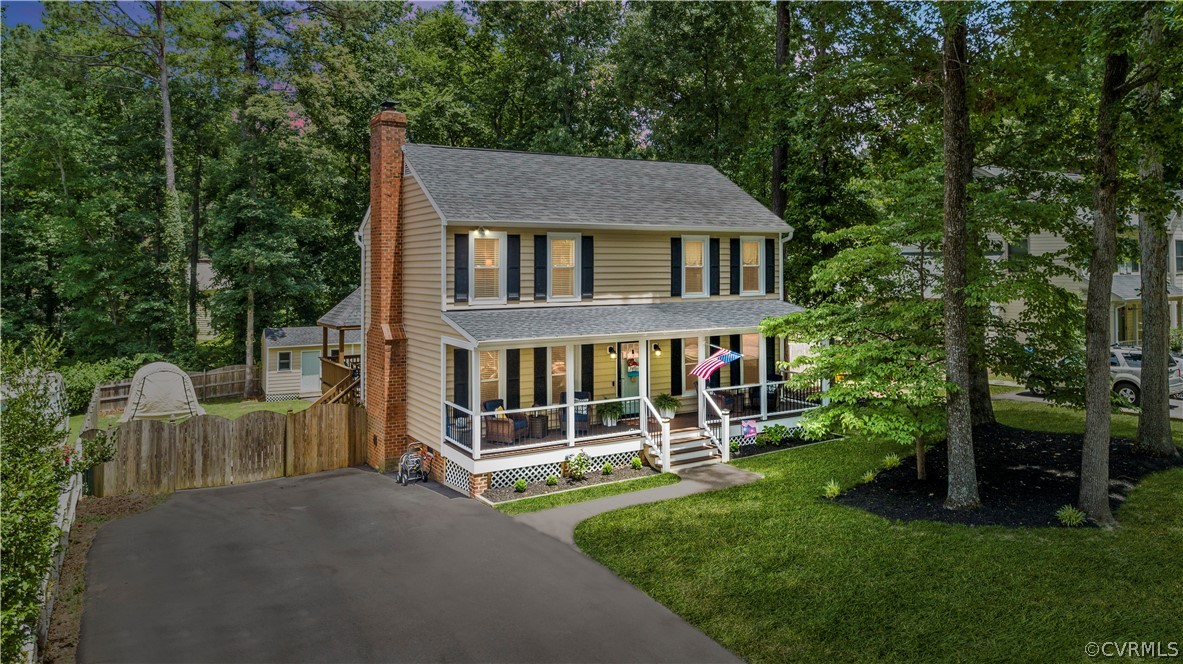 front view of a house with a yard