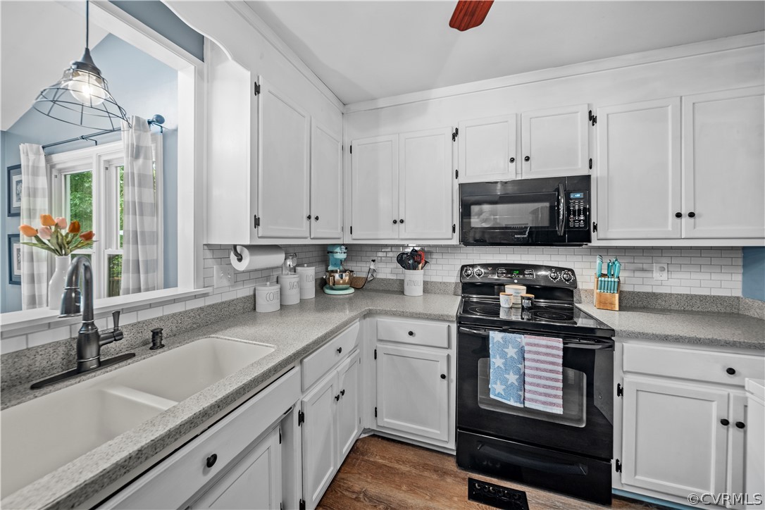 10806 Ridgerun Road Chesterfield, VA 23832 - Photo 15 of 48 a kitchen with stainless steel appliances granite countertop a sink a stove and a granite counter tops