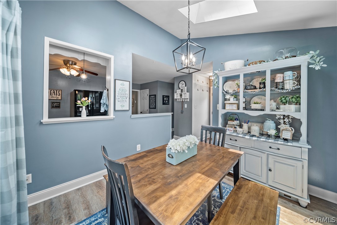 10806 Ridgerun Road Chesterfield, VA 23832 - Photo 17 of 48 a view of a dining room with furniture and chandelier