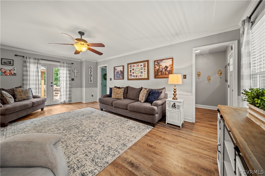 10806 Ridgerun Road Chesterfield, VA 23832 - Photo 6 of 48 a living room with furniture and a wooden floor