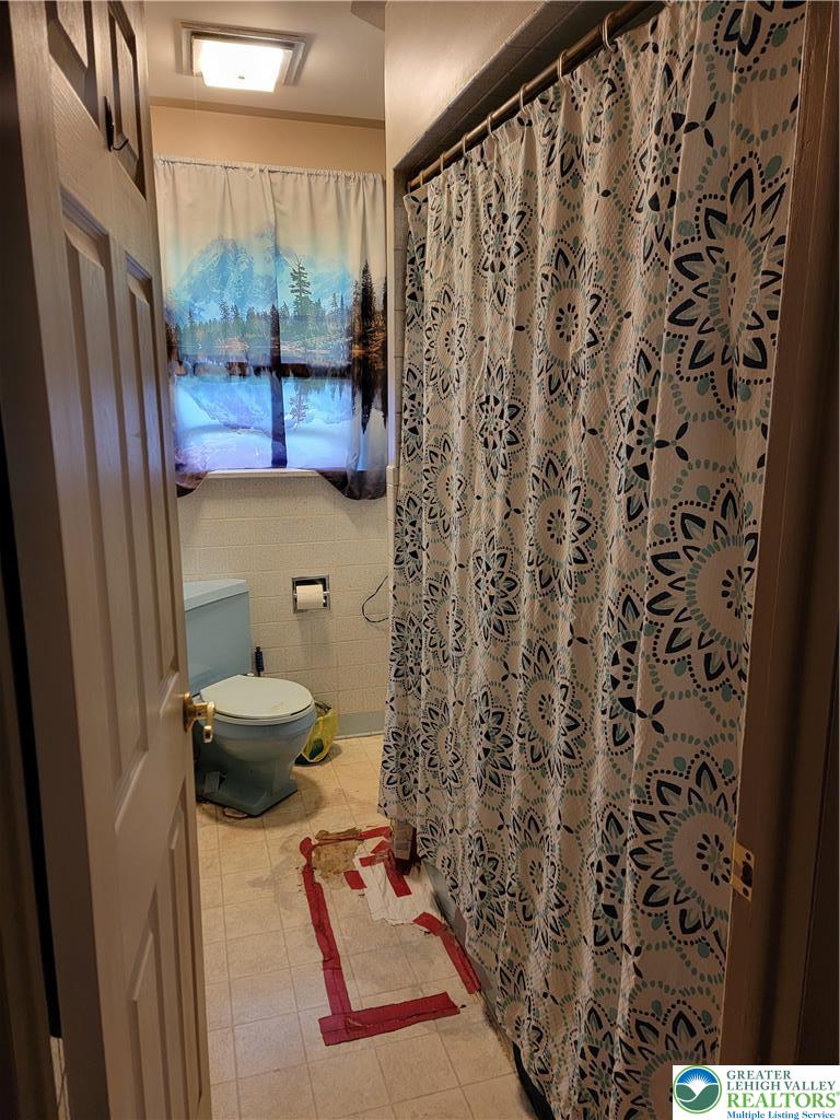 320 Hillside Street Forest City, PA 18421 - Photo 12 of 24 a bathroom with a sink and mirror