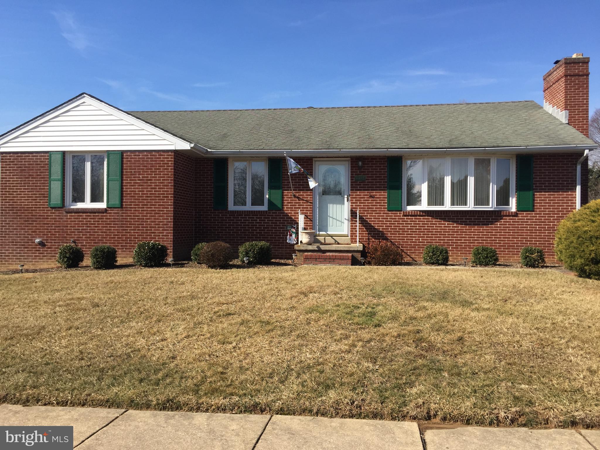 9412 Dawnvale Road Baltimore, MD 21236 - Photo 1 of 28 a front view of a house with a yard