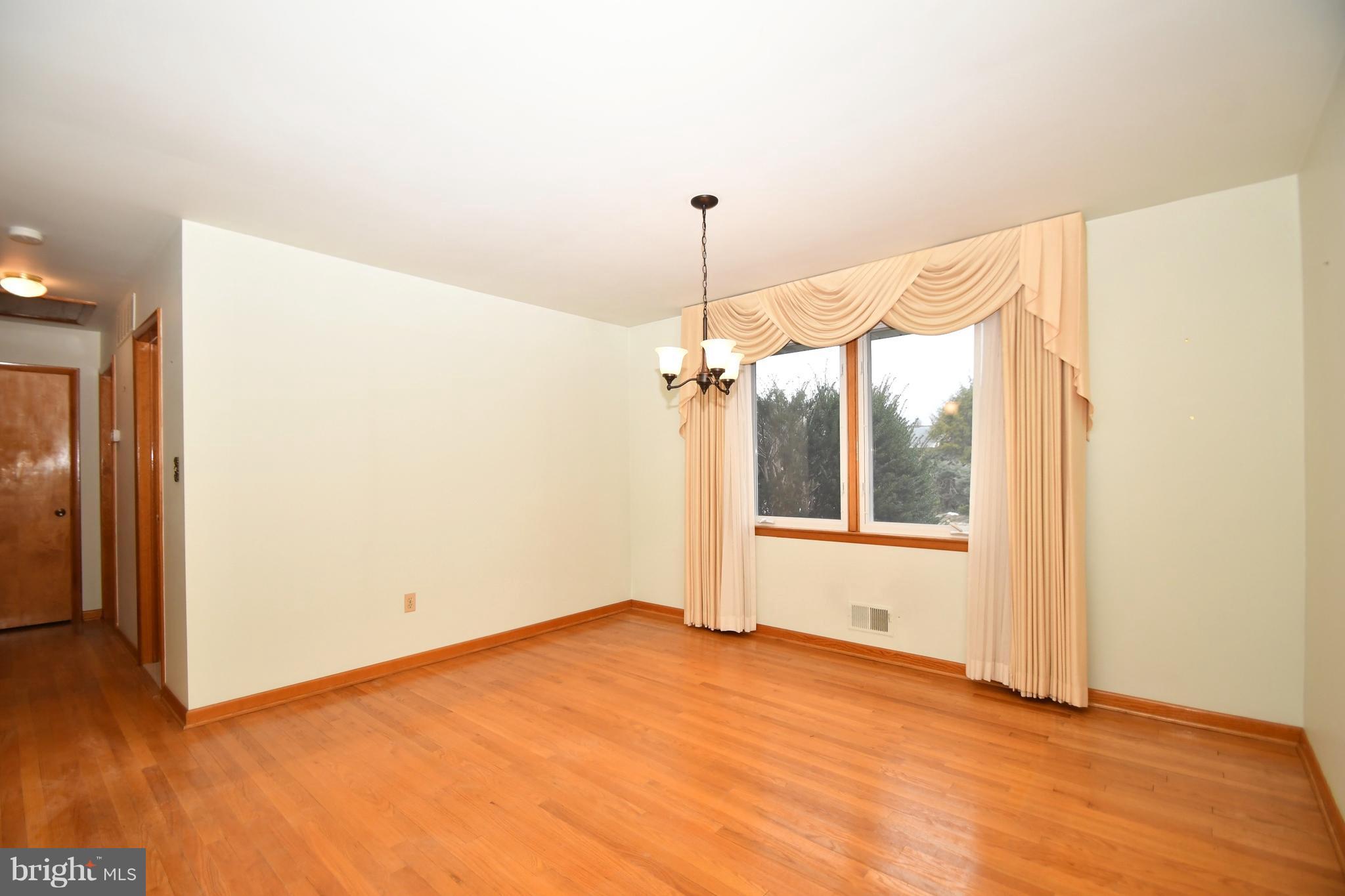 9412 Dawnvale Road Baltimore, MD 21236 - Photo 7 of 28 a view of a room with a natural light